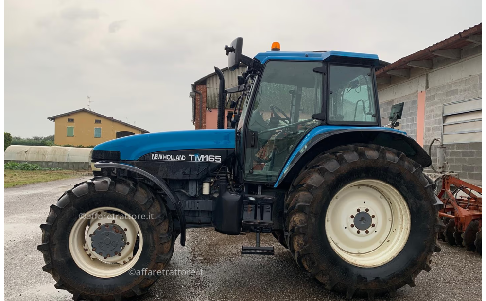 New Holland T165 Gebraucht - 1